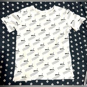 Puma kids white T-shirt w/ black “puma” word written all over it - size l